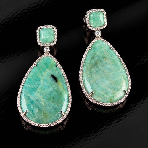 Zilveren oorringen oorbellen Model Green Crush gezet met groene stenen en cubic zirconia