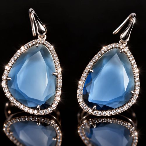 model Belinda oorringen in zilver gezet met blauwe steen en cubic zirconia