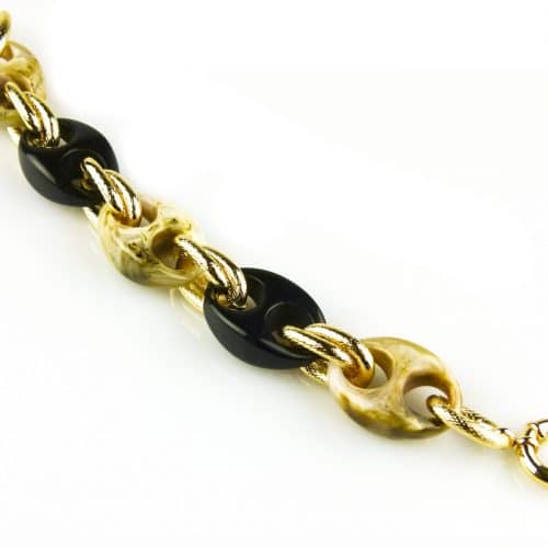 model St- Tropez armband in brons goudkleurige schakels en beige en zwarte resin - Armband
