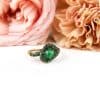 Ring in roos goud gezet met smaragd en zwarte diamant