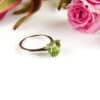 wit gouden solitair met peridoot