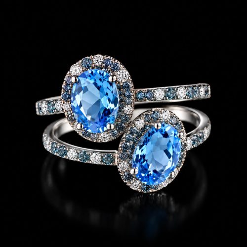Ring in wit goud gezet met blauwe topaas, londen topaas en diamant