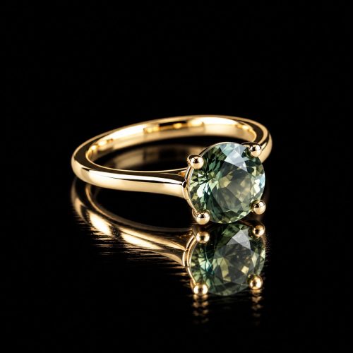 ring solitair in roos goud gezet met natuurlijke blauwe zirkoon