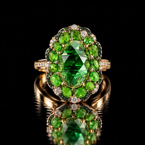 Roos gouden ring gezet met zwarte en witte diamant en tsavoriet