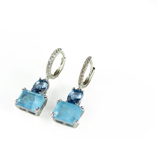 Zilveren oorringen oorbellen gezet met blauwe stenen