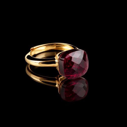 Ring in zilver geelgoud verguld model pomellato rode steen