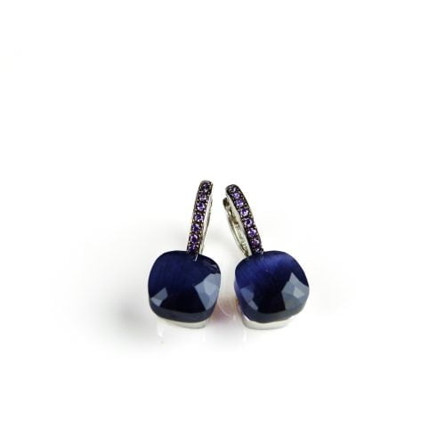 Zilveren oorringen oorbellen model pomellato gezet met donker blauwe steen