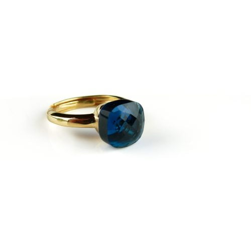 Ring in zilver geelgoud verguld model pomellato donker blauwe steen