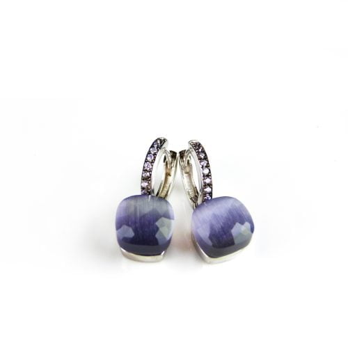 Zilveren oorringen oorbellen model pomellato gezet met grijs blauwe steen
