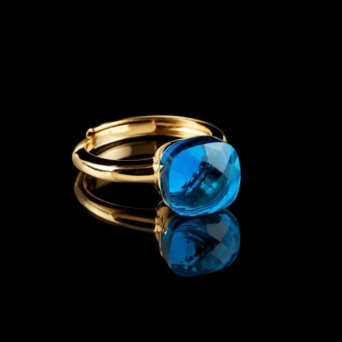 Ring in zilver geelgoud verguld model pomellato turkoois blauwe steen