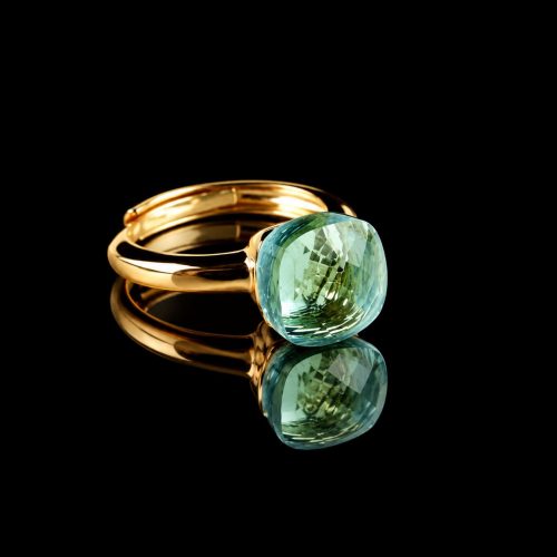 Ring in zilver geelgoud verguld model pomellato licht blauwe steen