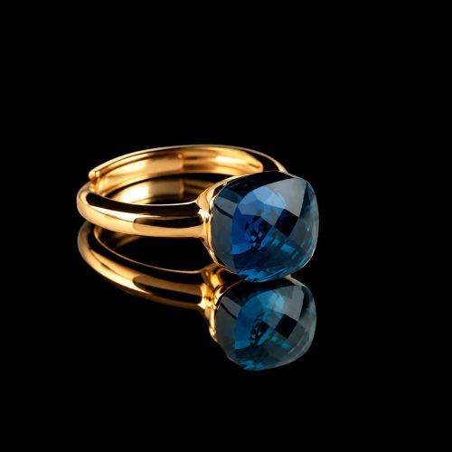 Ring in zilver geelgoud verguld model pomellato donker blauwe steen