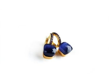 Zilveren oorringen oorbellen geelgoud verguld model pomellato gezet met donker blauwe steen