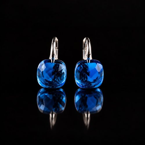 Zilveren oorringen oorbellen model pomellato blauwe steen