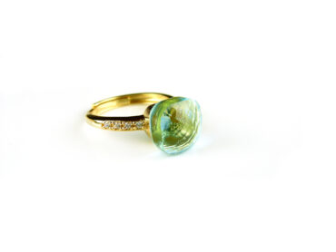 Zilveren ring geelgoud verguld model pomellato licht blauwe steen en cubic zirconia