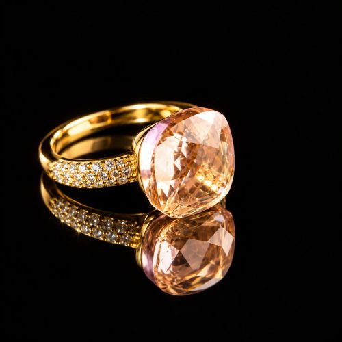 Ring in zilver geelgoud verguld model pomellato groot met roze steen en cubic zirconia