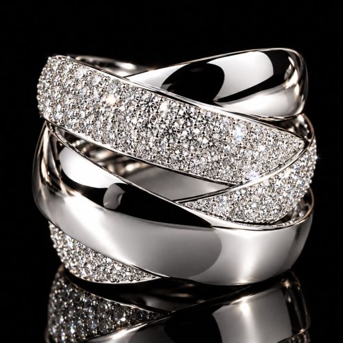 Brede ring in wit goud gezet met diamant