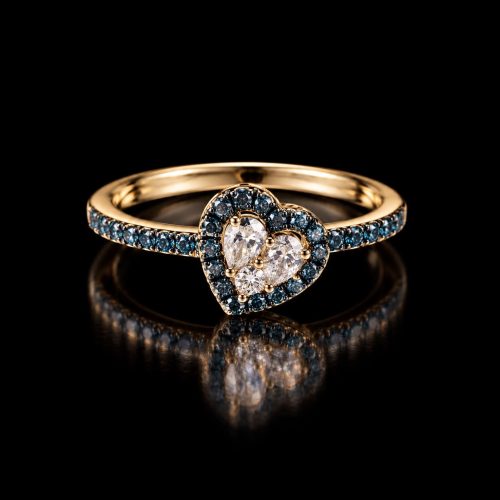 Ring in roos goud gezet met blauwe topaas en diamant