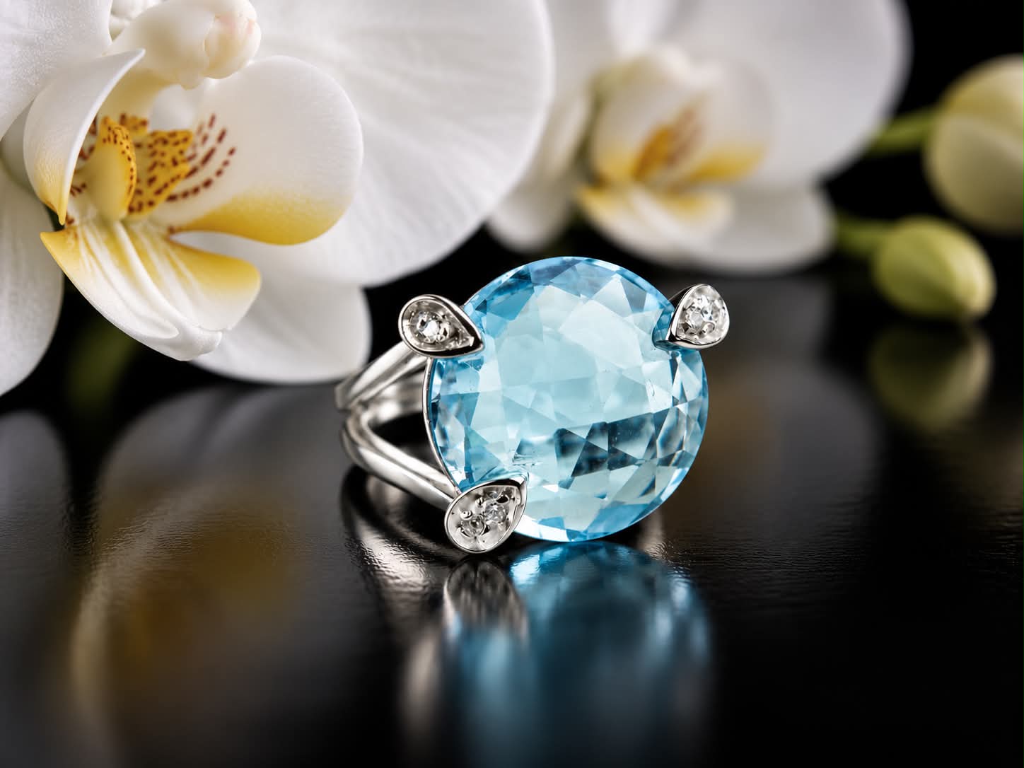 Ring in wit goud gezet met blauwe topaas en diamant