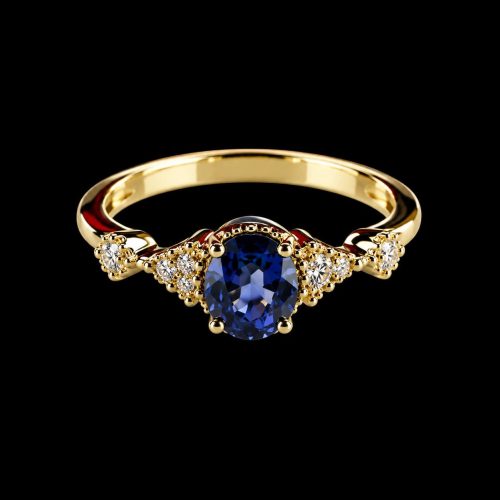ring in geel goud gezet met blauwe saffier en diamant
