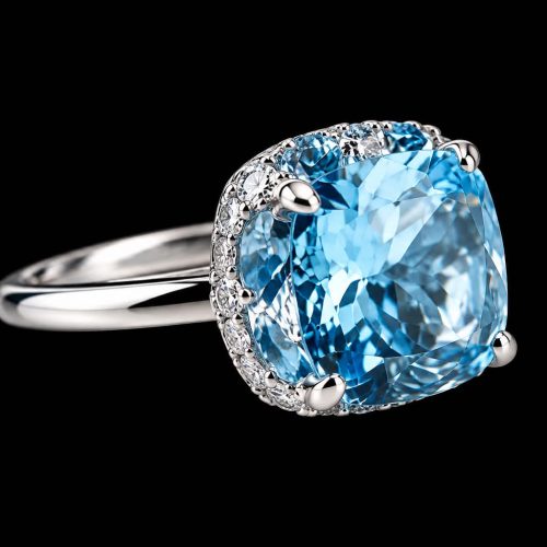 ring in wit goud gezet met blauwe topaas en diamant