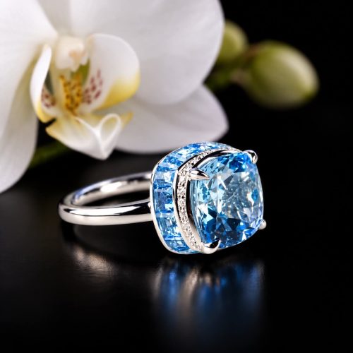 ring in wit goud gezet met blauwe topaas en diamant