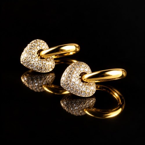 oorringen in geel en wit goud gezet met diamant hartvorm