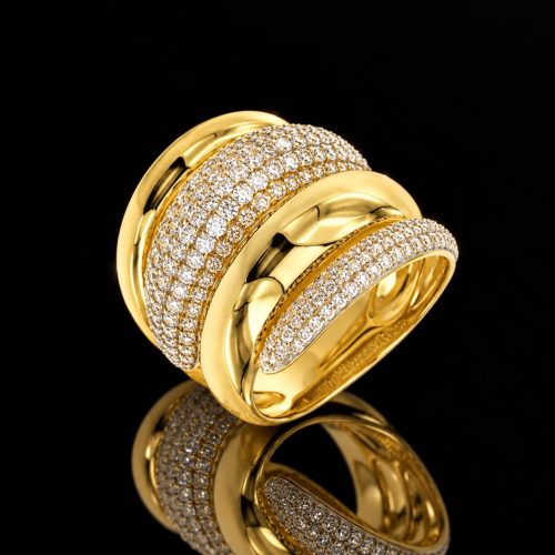 Brede ring in zilver geelgoud verguld gezet met cubic zirkonia