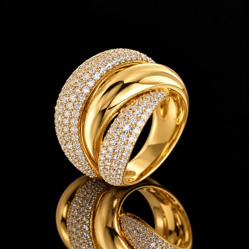 Brede ring in zilver geelgoud verguld gezet met cubic zirkonia