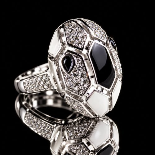 Zilveren ring slangenkop met witte en zwarte email en cubic zirconia