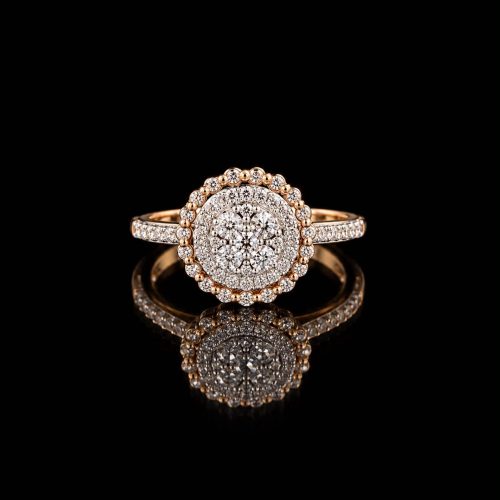 Wit en roségouden ring gezet met diamanten