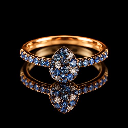 Ring in roos goud gezet met londen topaas en diamant
