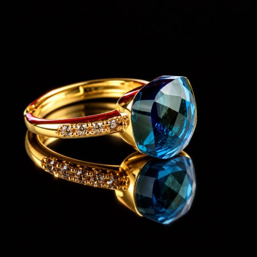 Ring in zilver geelgoud verguld model Pomellato met blauwe steen en cubic zirconia