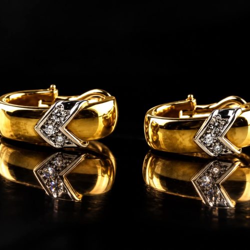 oorringen in geel en wit goud gezet met diamant