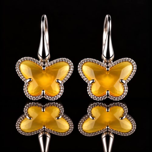 Zilveren oorringen oorbellen model Vlinder gezet met amberkleurige steen