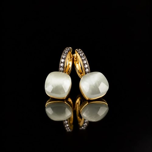 Zilveren oorringen oorbellen geelgoud verguld model pomellato met witte steen