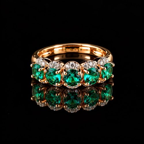 Ring in zilver roos goud verguld gezet met groene stenen en cubic zirconia