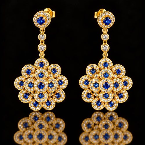 Model Blue Flower zilveren oorringen geel goud verguld gezet met blauwe steentjes