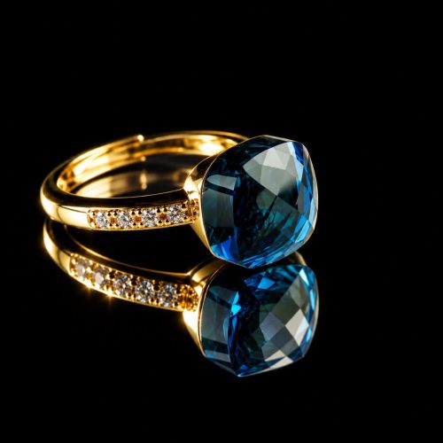 Zilveren ring geelgoud verguld model pomellato blauwe steen en cubic zirconia