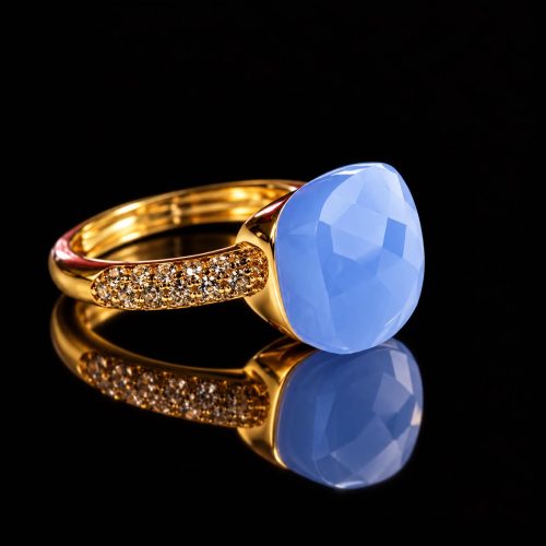 Ring in zilver geelgoud verguld model Pomellato met licht blauwe steen en cubic zirconia