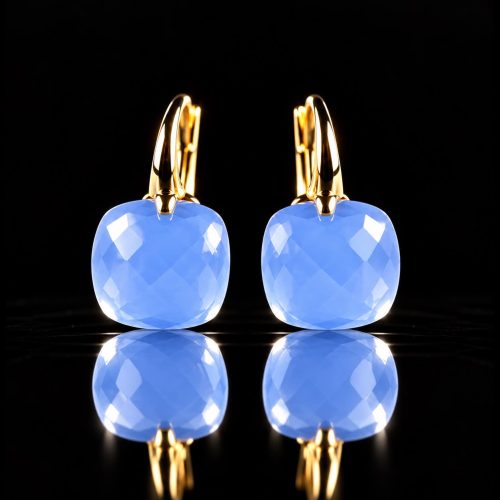 Zilveren oorringen oorbellen geelgoud verguld model pomellato met licht blauwe steen