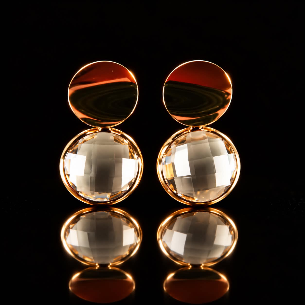 Oorringen Model 1 Round goudkleurig met roze steen