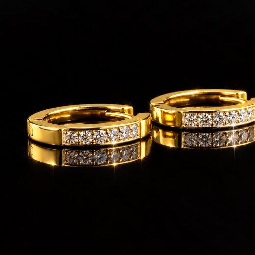 oorringen in geel en wit goud gezet met diamant