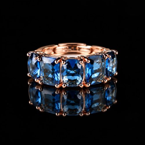 Ring in zilver roos goud verguld gezet met rechthoekige blauwe cubic zirconia stenen