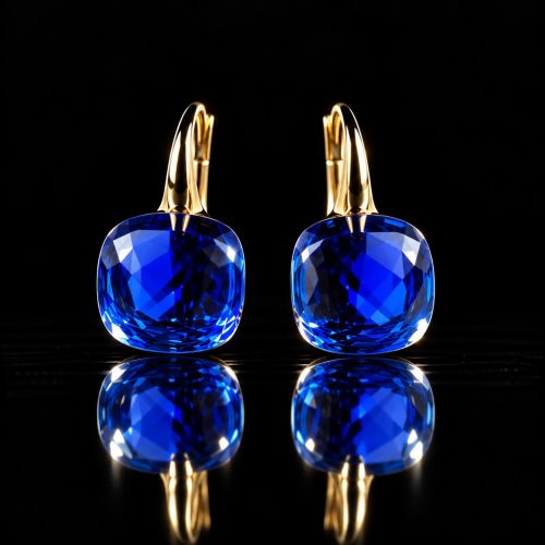 Zilveren oorringen oorbellen geelgoud verguld model pomellato met fel blauwe steen