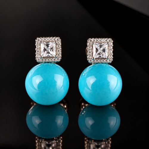 Zilveren oorringen oorbellen turkooise blauwe steen en cubic zirconia