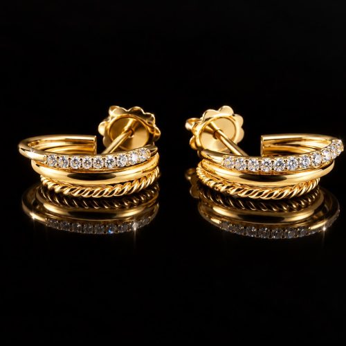 Oorringen in geel en wit goud gezet met diamant