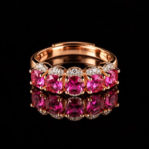 Ring in zilver roos goud verguld gezet met rode stenen en cubic zirconia