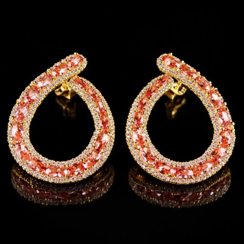 Grote zilveren oorringen geelgoud verguld met champagne kleurige stenen en cubic zirconia