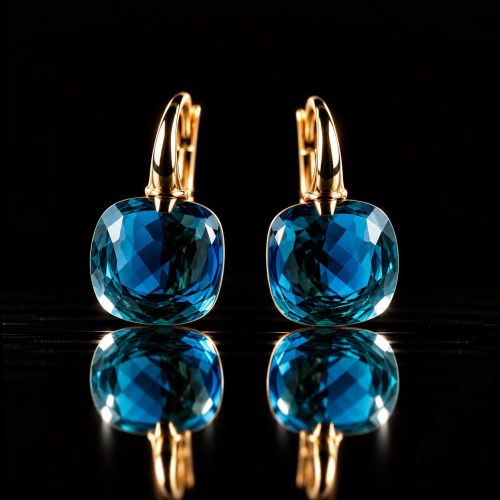 Zilveren oorringen oorbellen geelgoud verguld model pomellato met donker blauwe steen